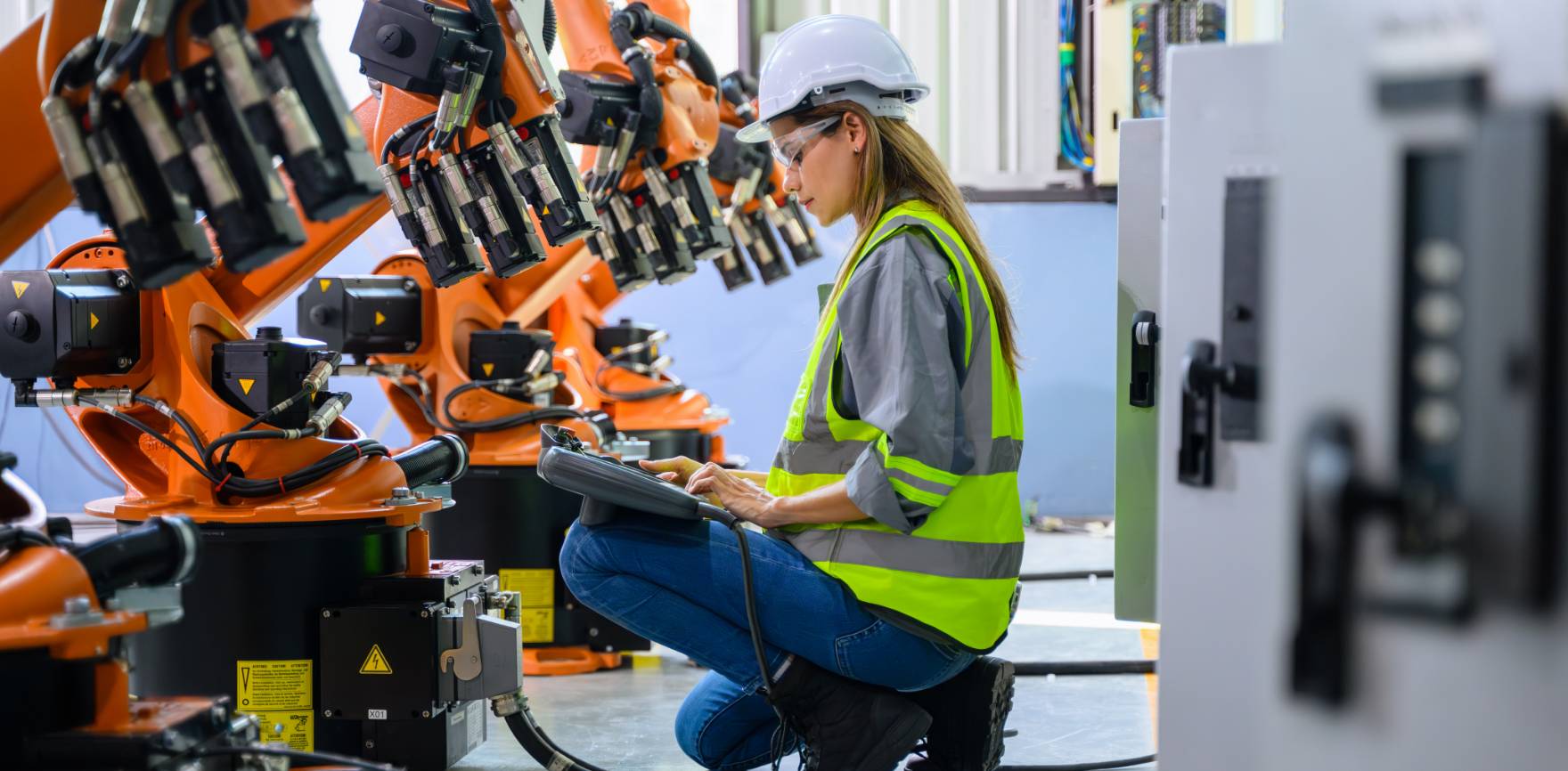 Woman Working on Machinery